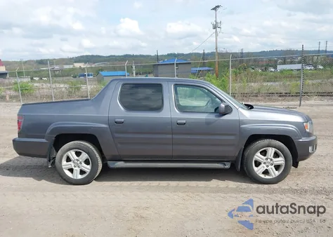 2014 Honda Ridgeline Rtl z USA, uszkodzony, nr VIN 5FPYK1F50EB003633